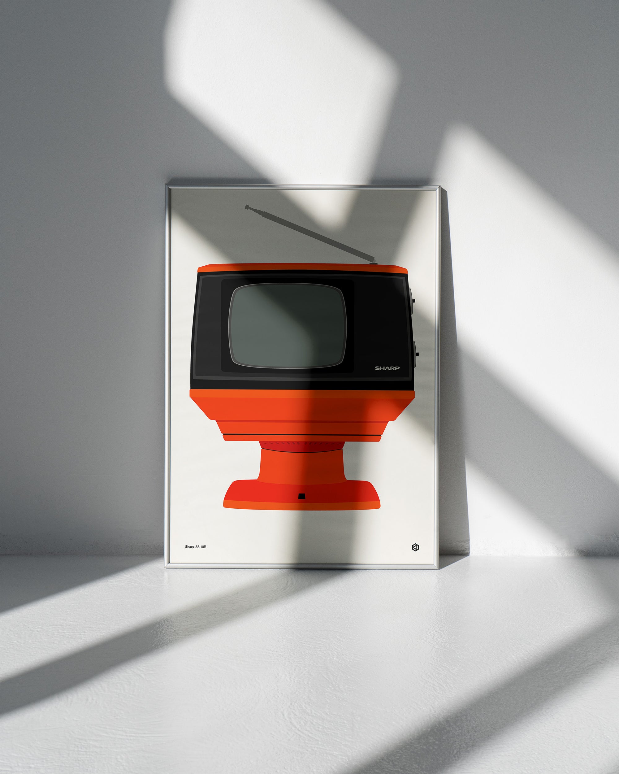 Framed artwork of a retro-style television on a white surface with shadows.
